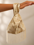 Japanese knot gold bag with a fringe
