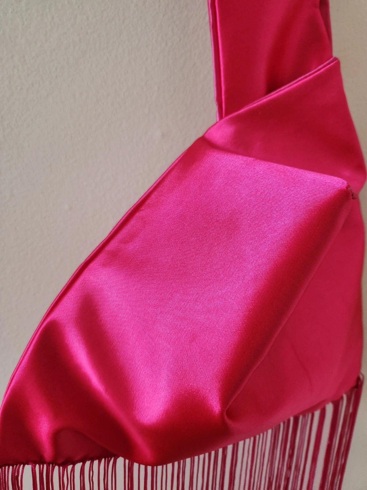 Japanese knot wrist bag in hot pink