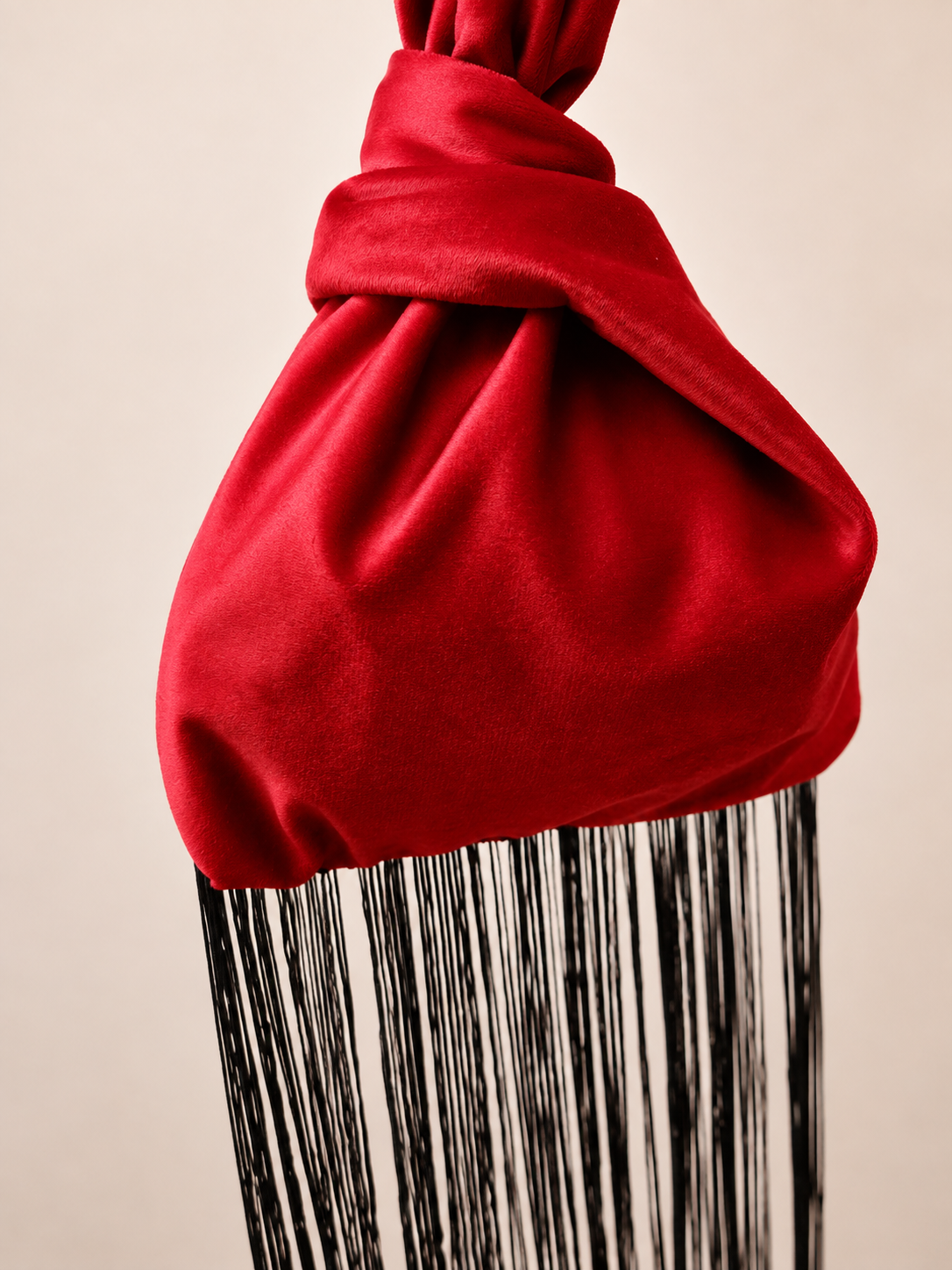 Japanese knot Medusa red and black long fringe wrist bag