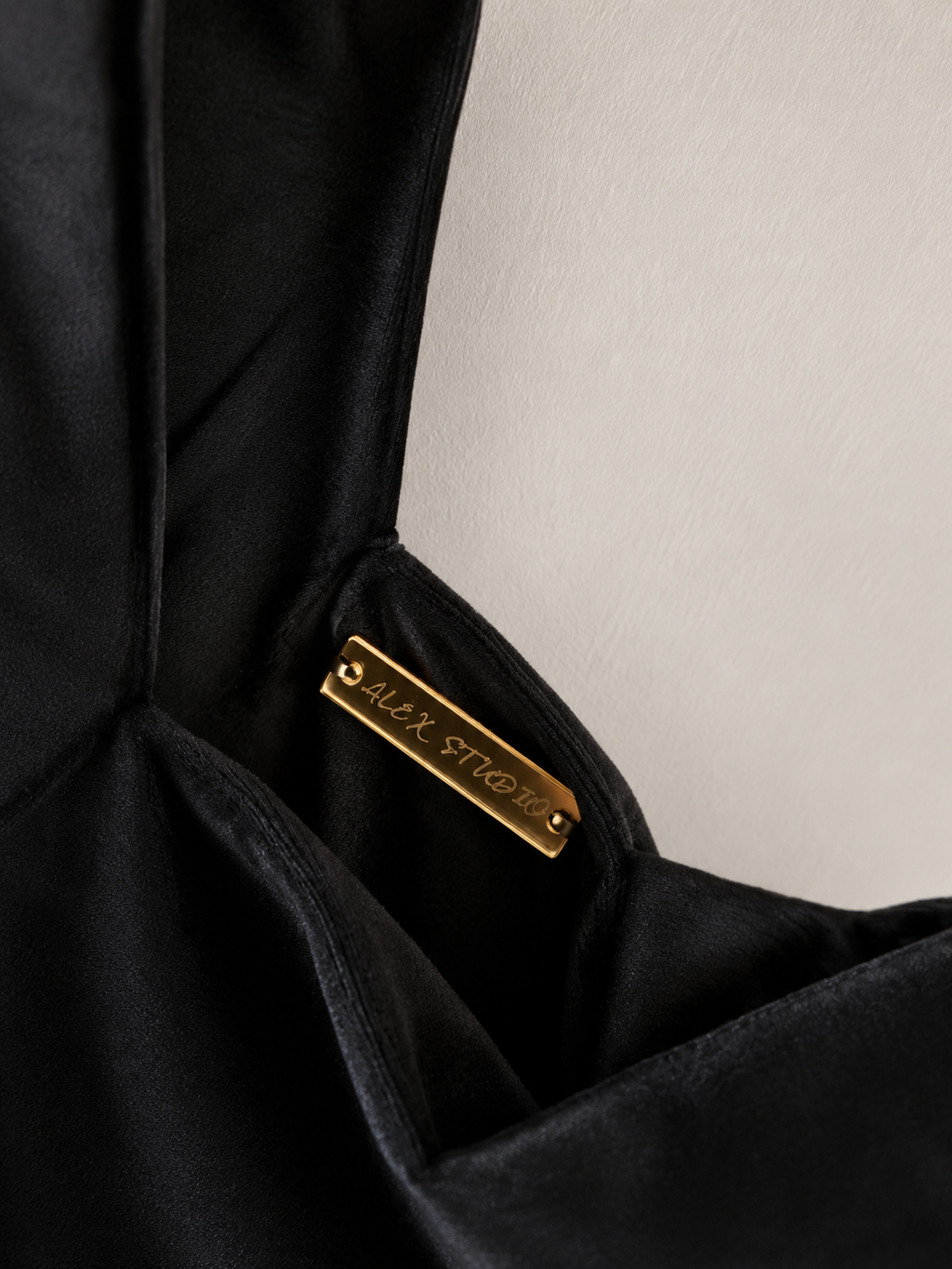 Japanese knot 'Medusa' black velvet bag with a fringe trim
